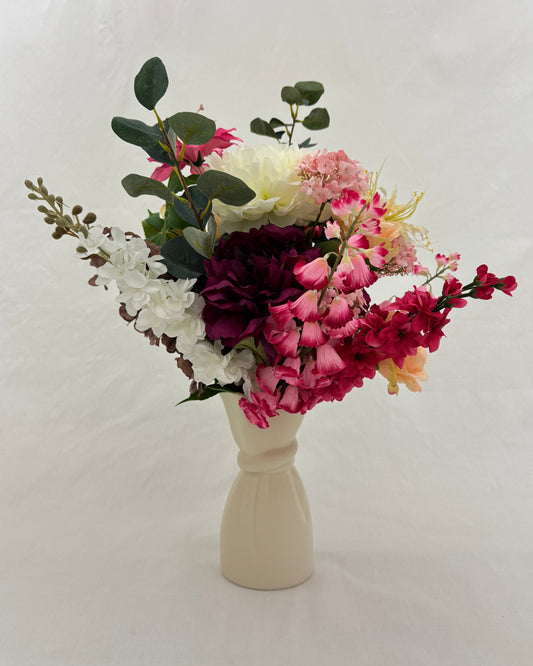 rouwboeket roze wit in vaas