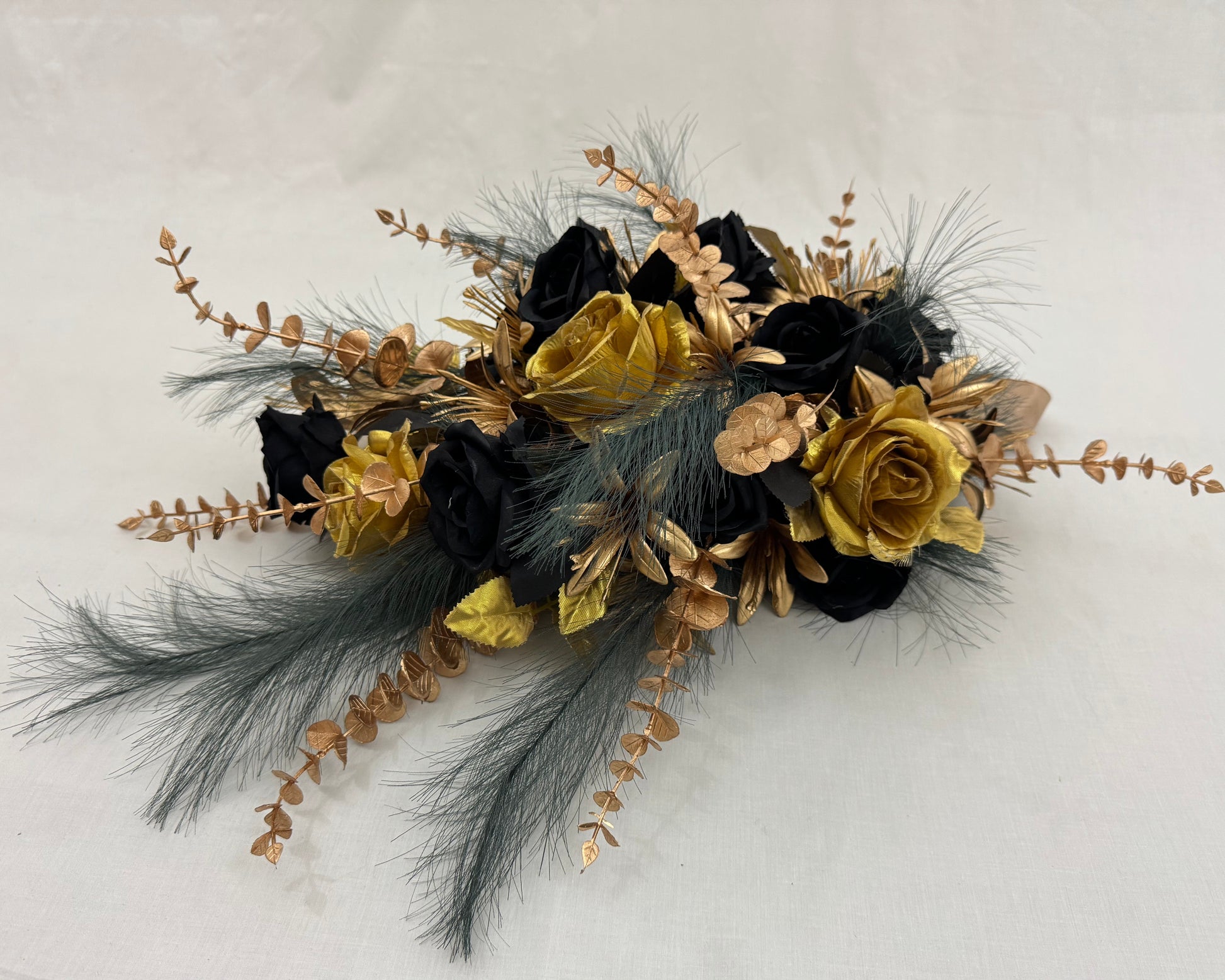 Druppelvormig rouwstuk goud