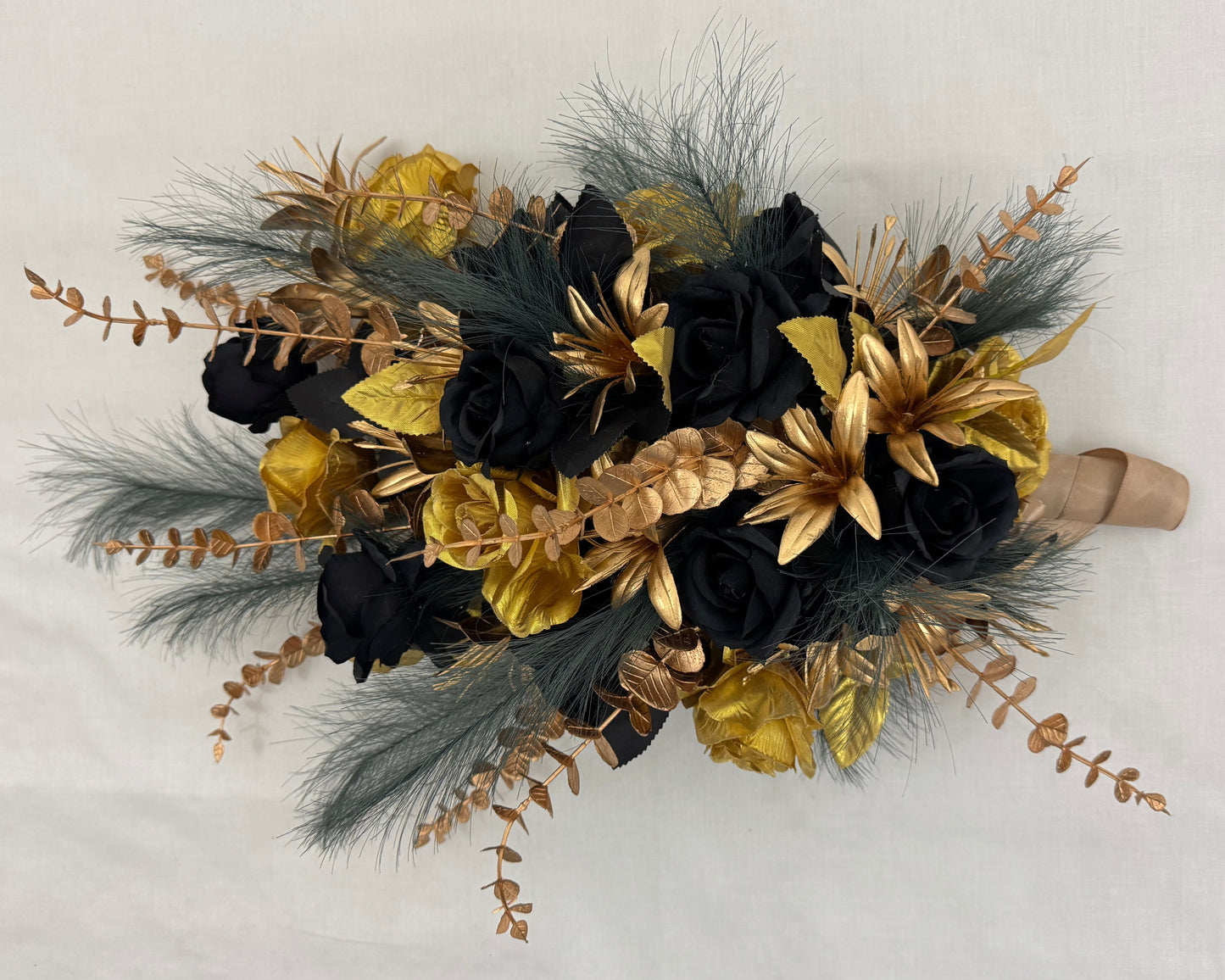 Druppelvormig rouwstuk goud