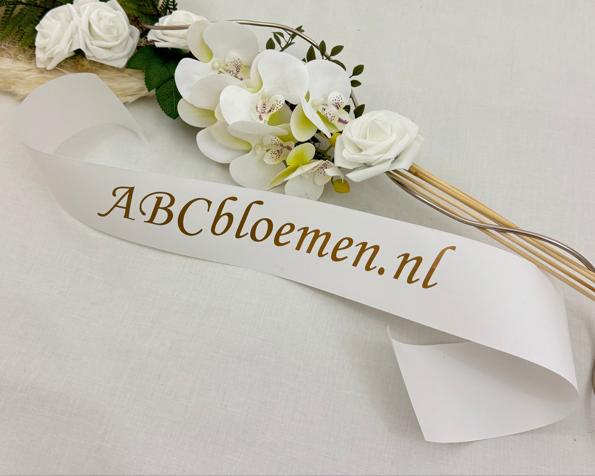 Rouwlint met gouden letters