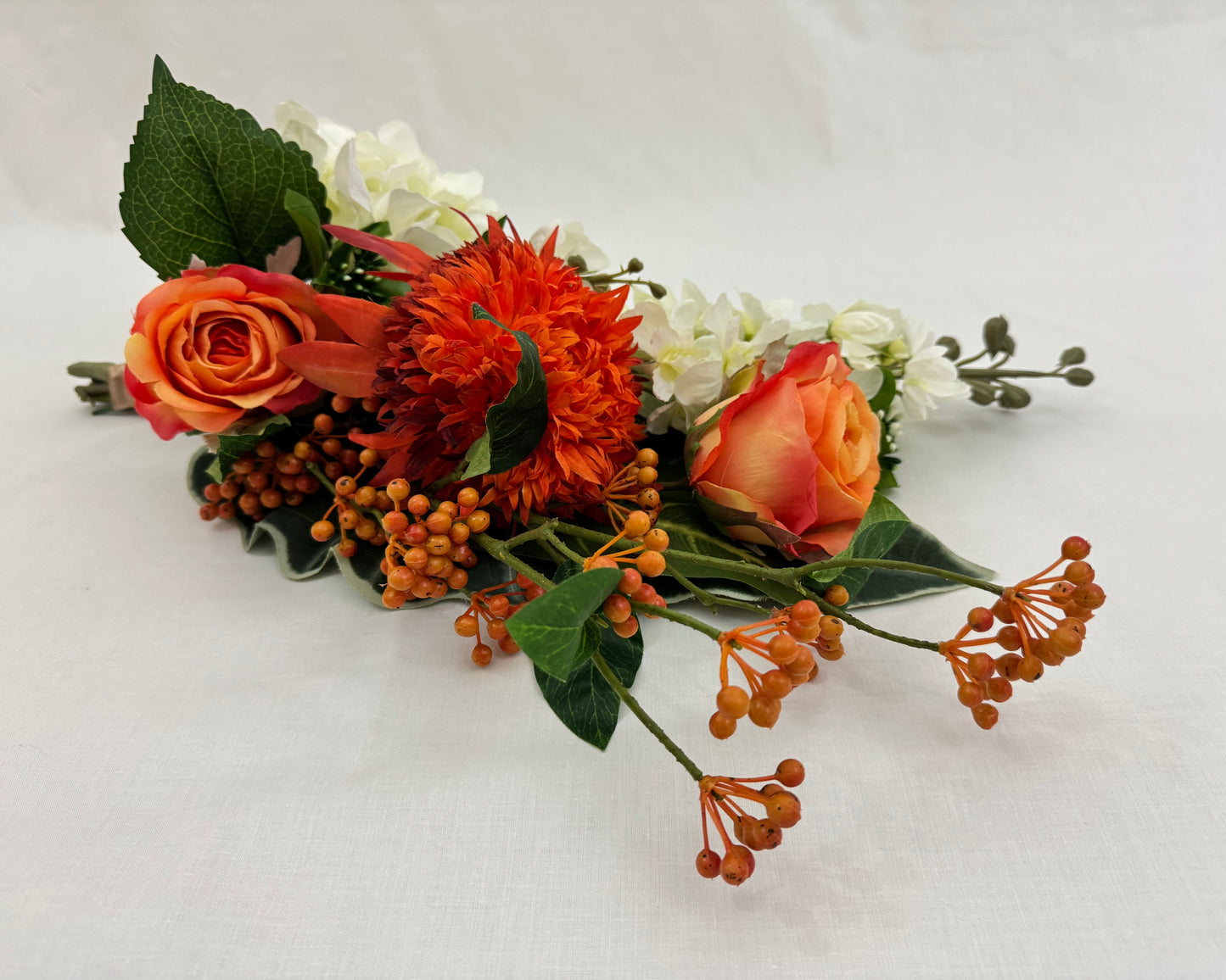 rouwboeket oranje rozen