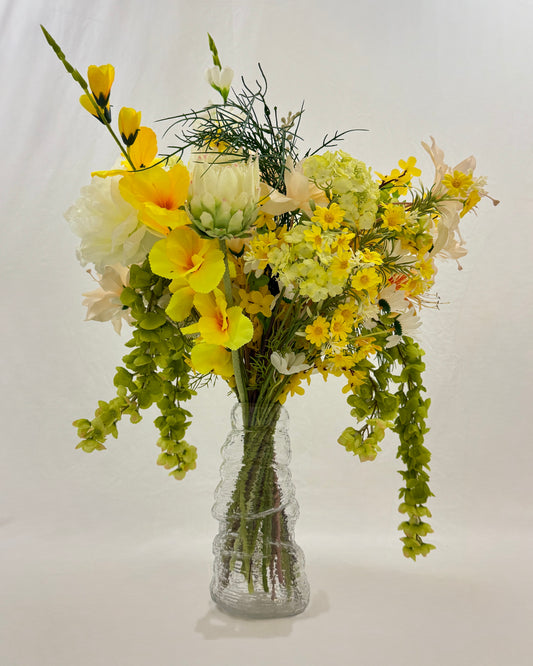 Rouwboeket met gele bloemen