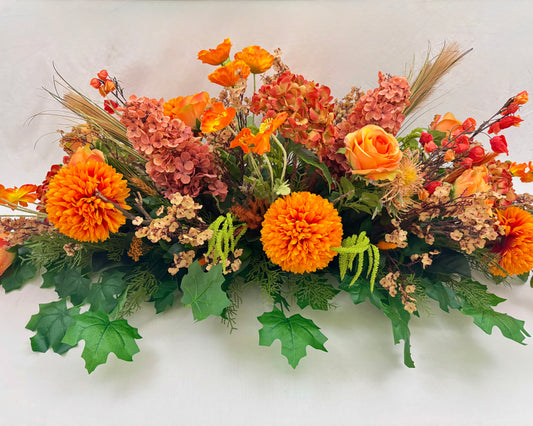 Oranje rouwstuk geschikt als kistbedekking