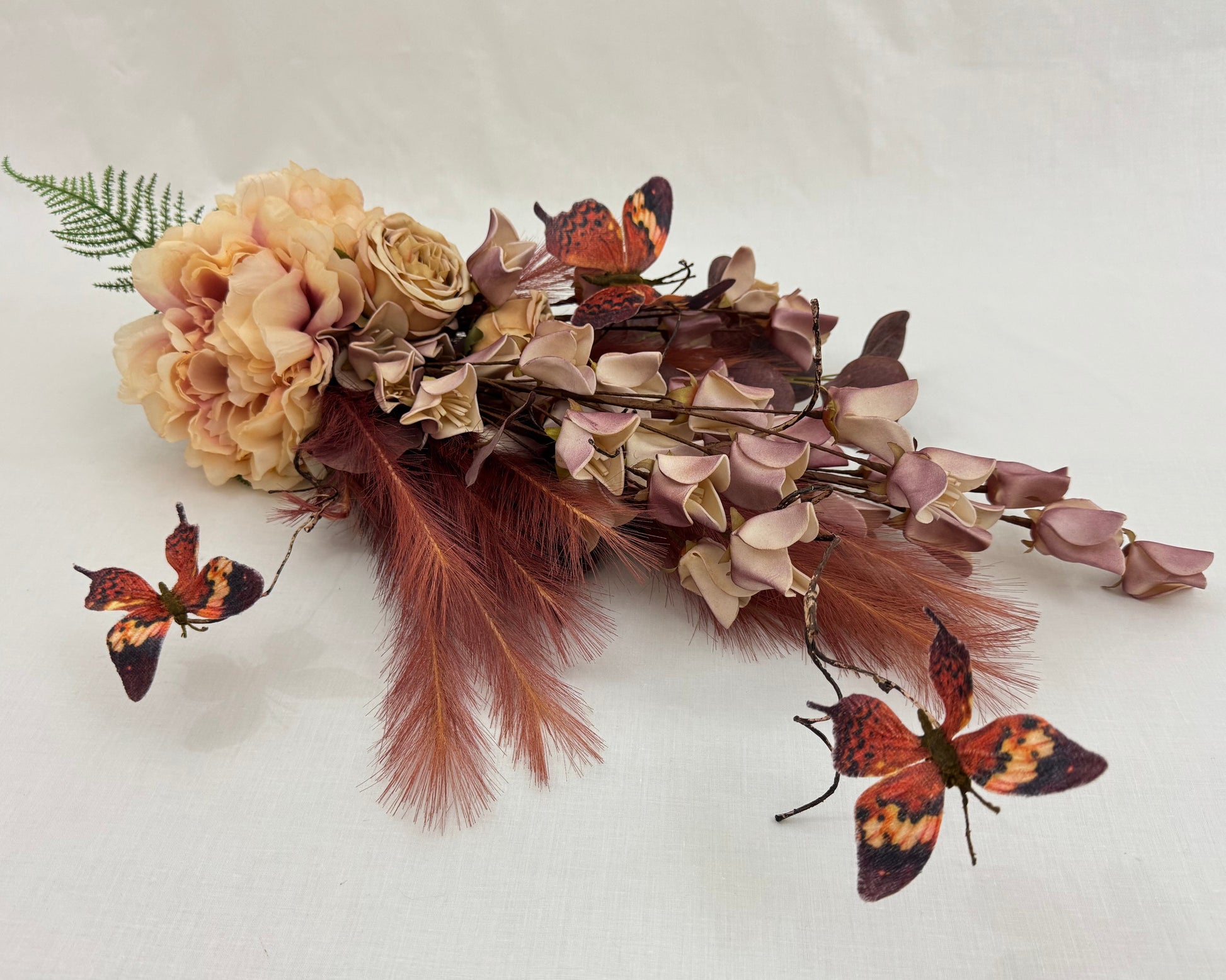 rouwboeket met vlinders