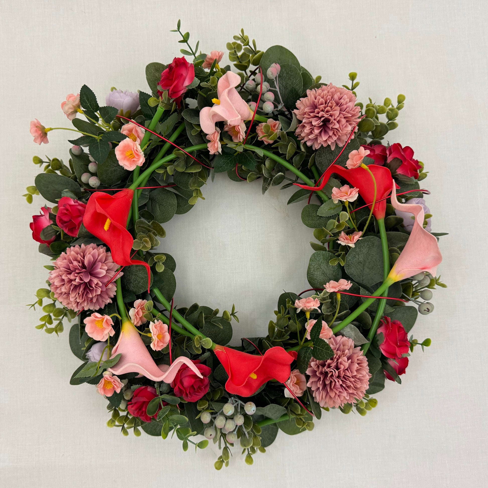 rouwkrans roze rood