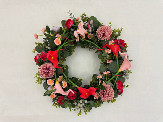 Rouwkrans met calla's en dahlia's