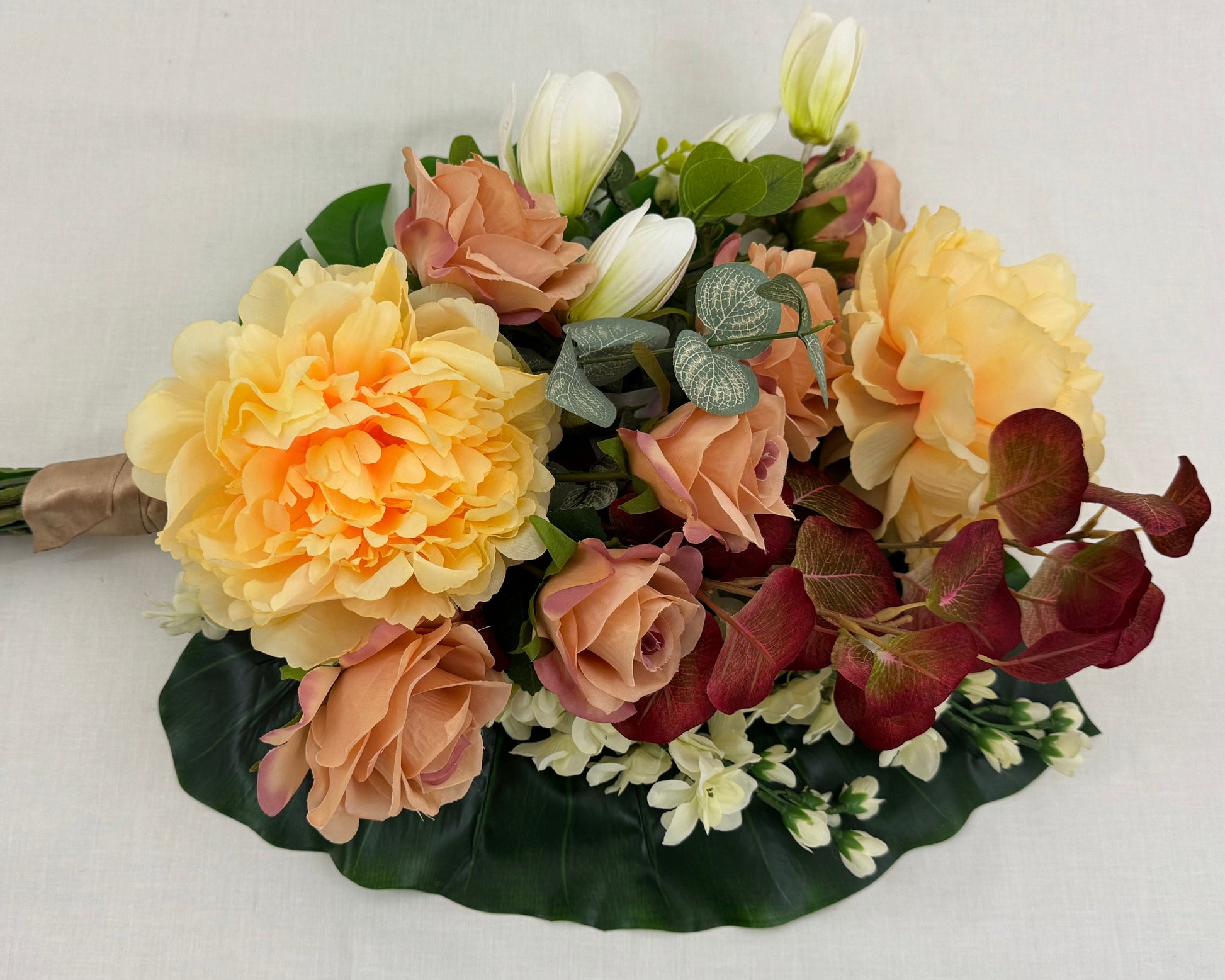 rouwstuk met pioenrozen