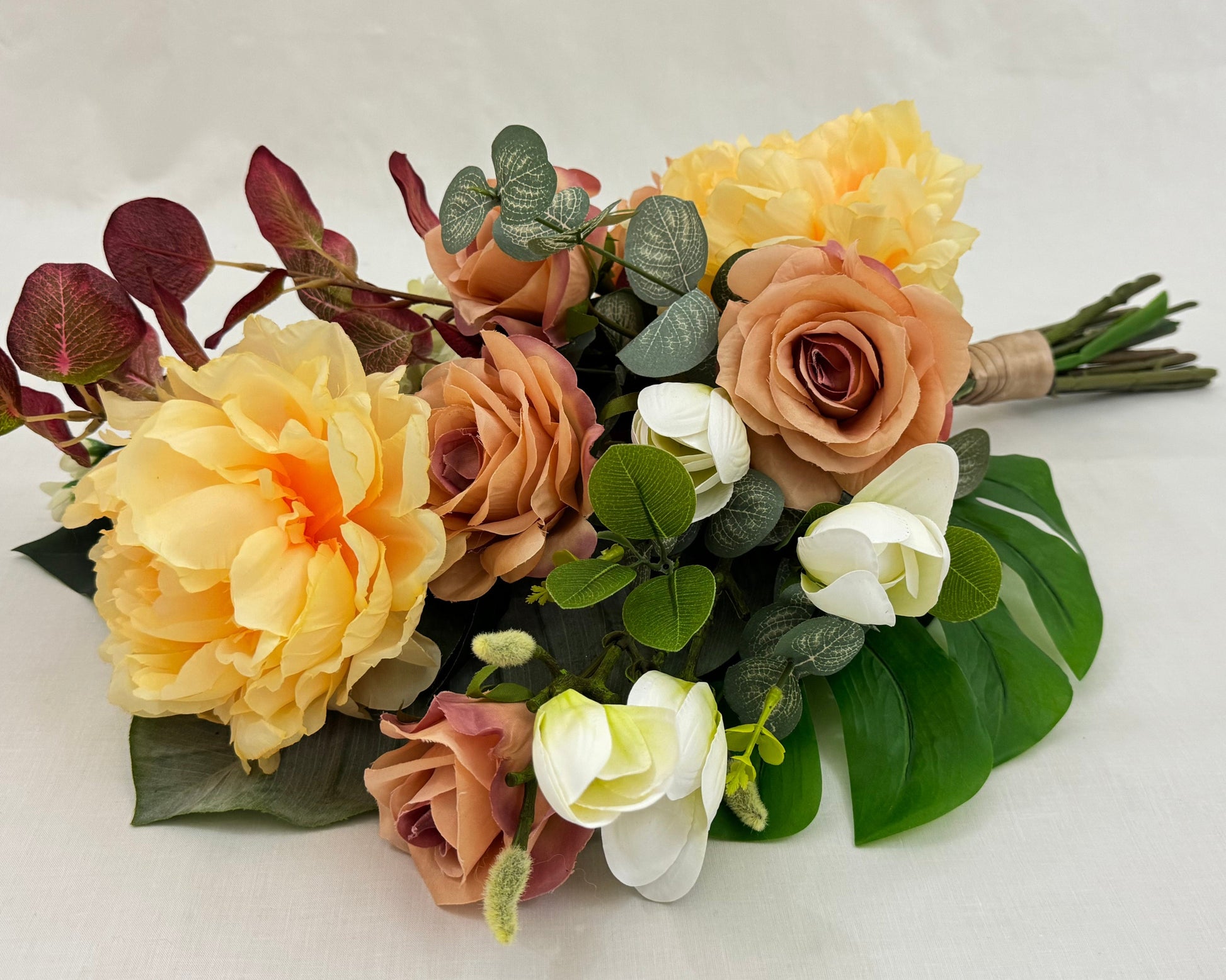 rouwstuk met pioenrozen