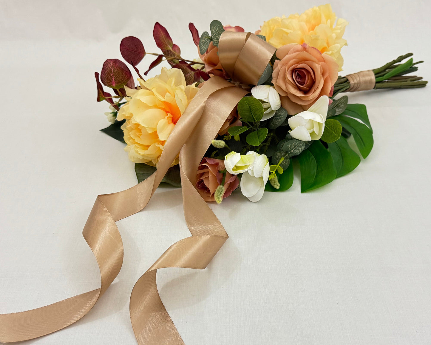 rouwstuk met pioenrozen