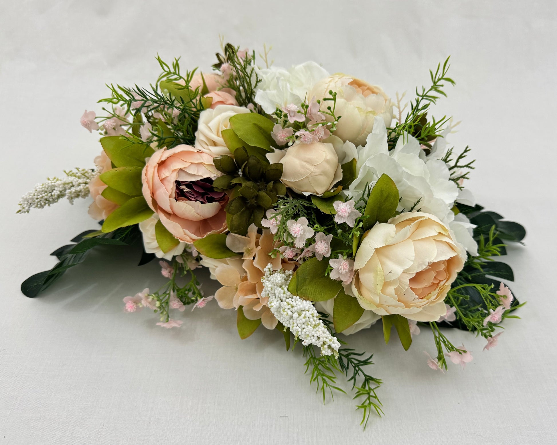 Rouwboeket met pioenrozen bestellen