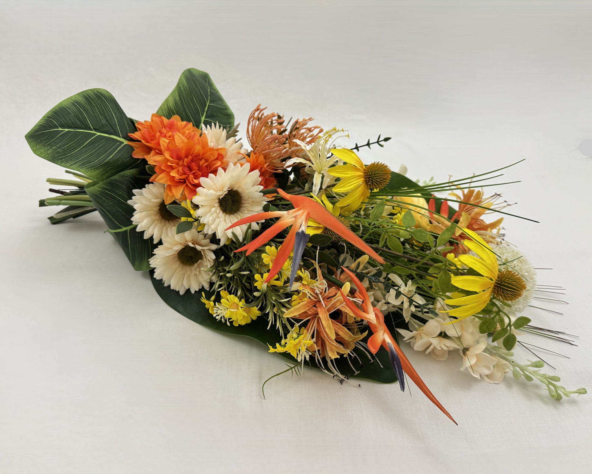 Rouwboeket oranje geel