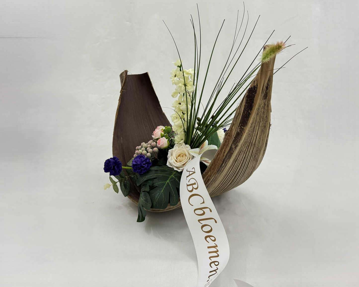 bananenblad rouwstuk met lint