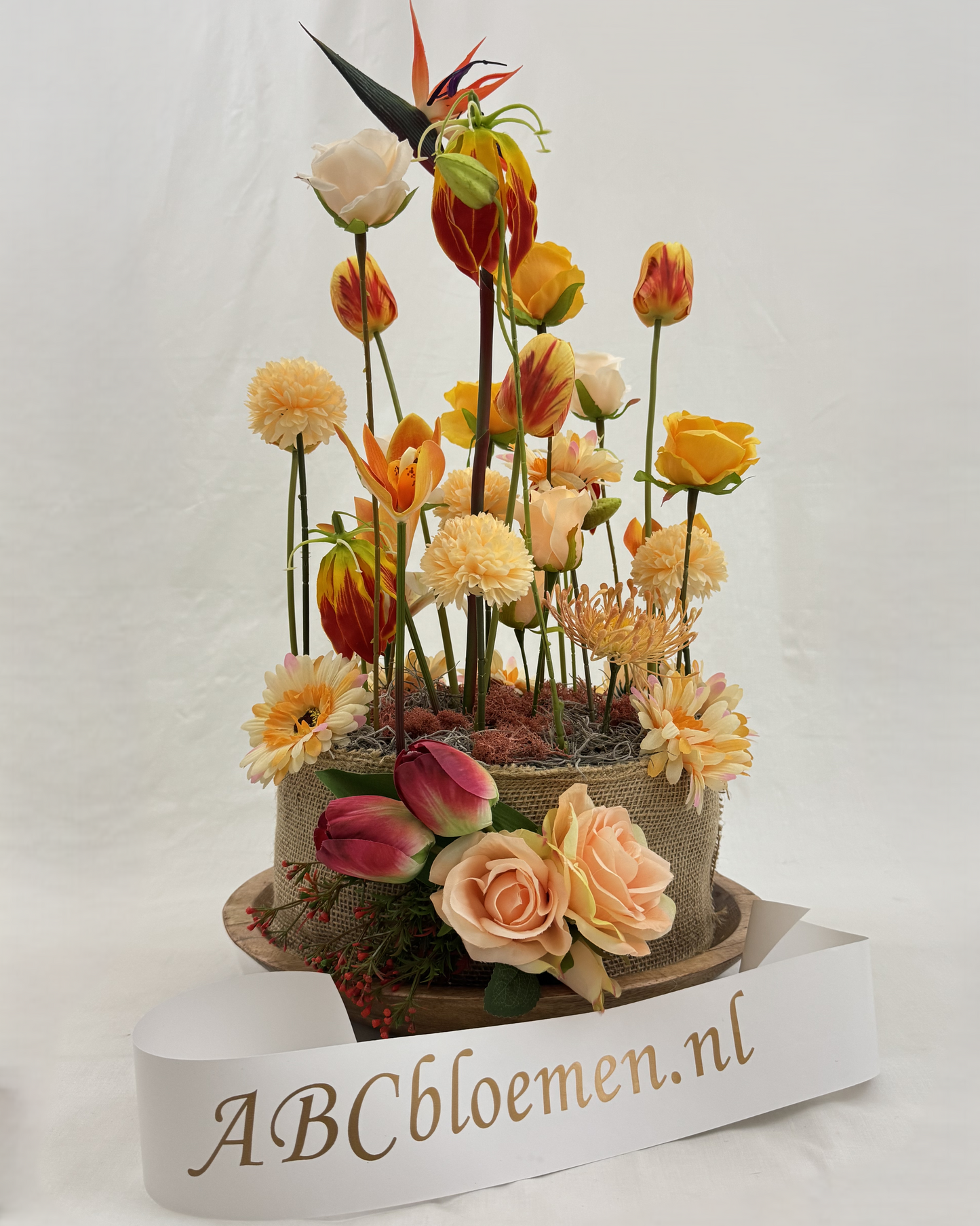 Rouwbloemen lente geel met lint