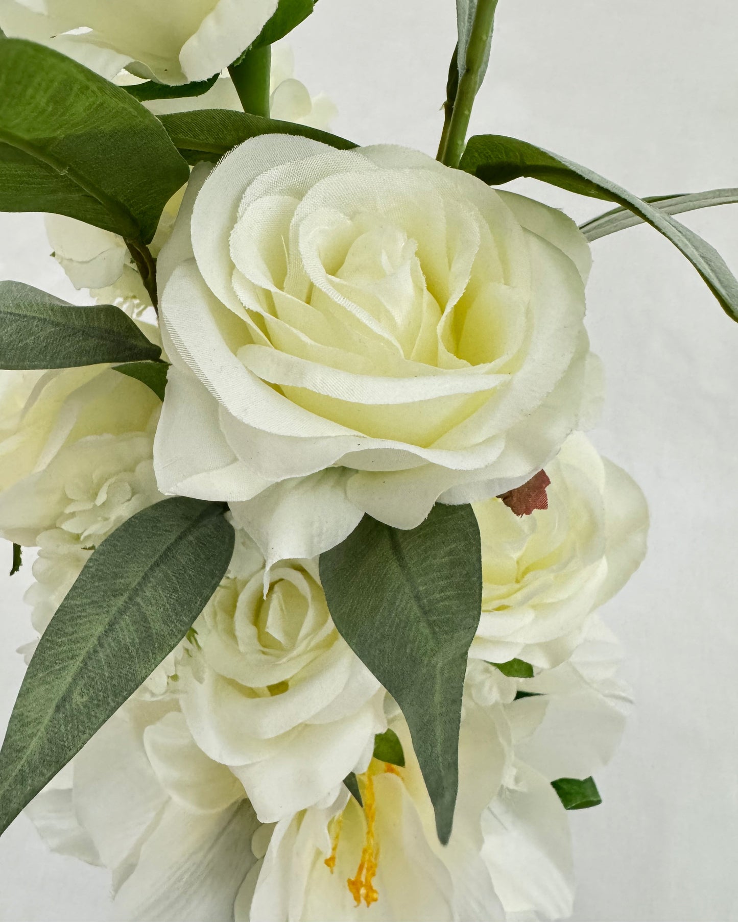 Witte roos in rouwboeket