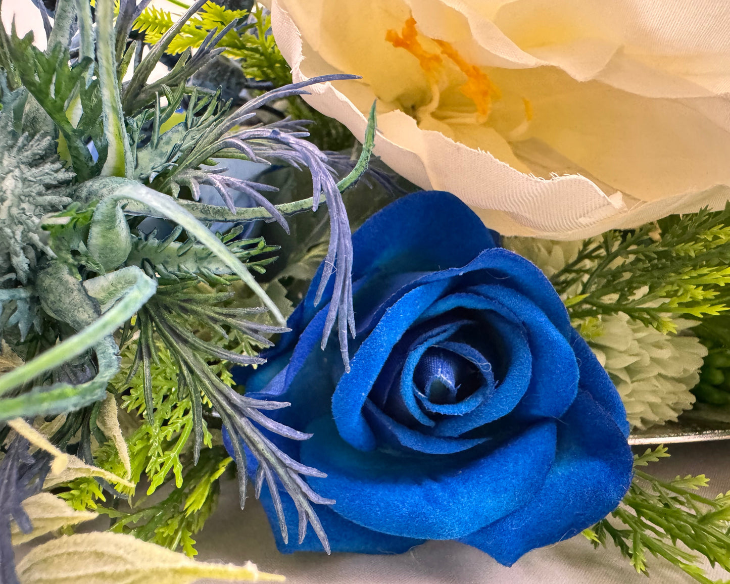 Blauwe roos in rouwstuk