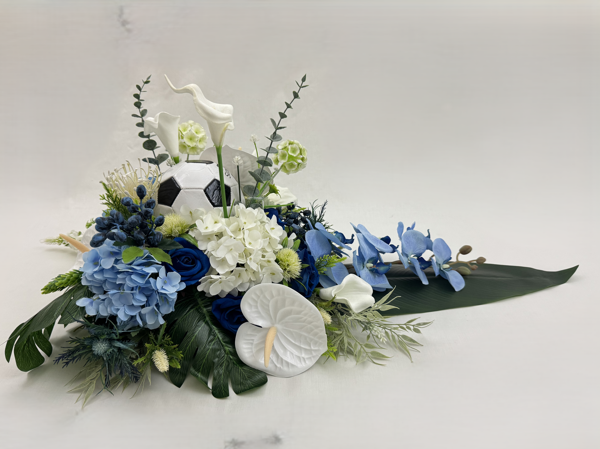 Rouwstuk blauw met voetbal