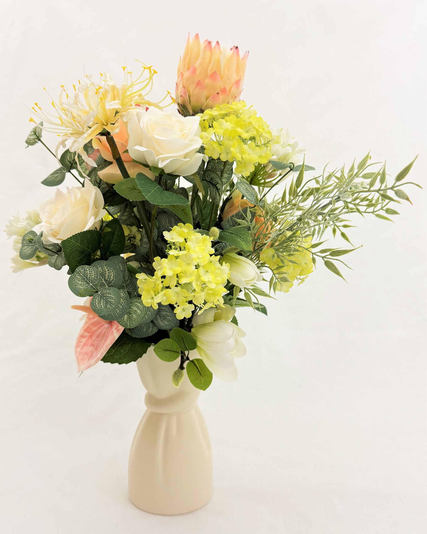 rouwboeket roze wit in vaas