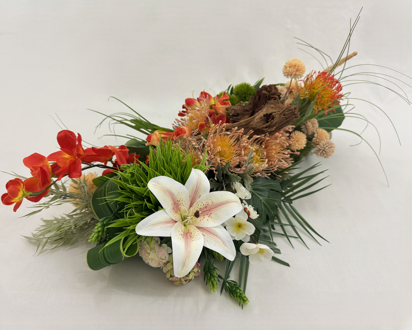 rouwstuk met lelie en hout