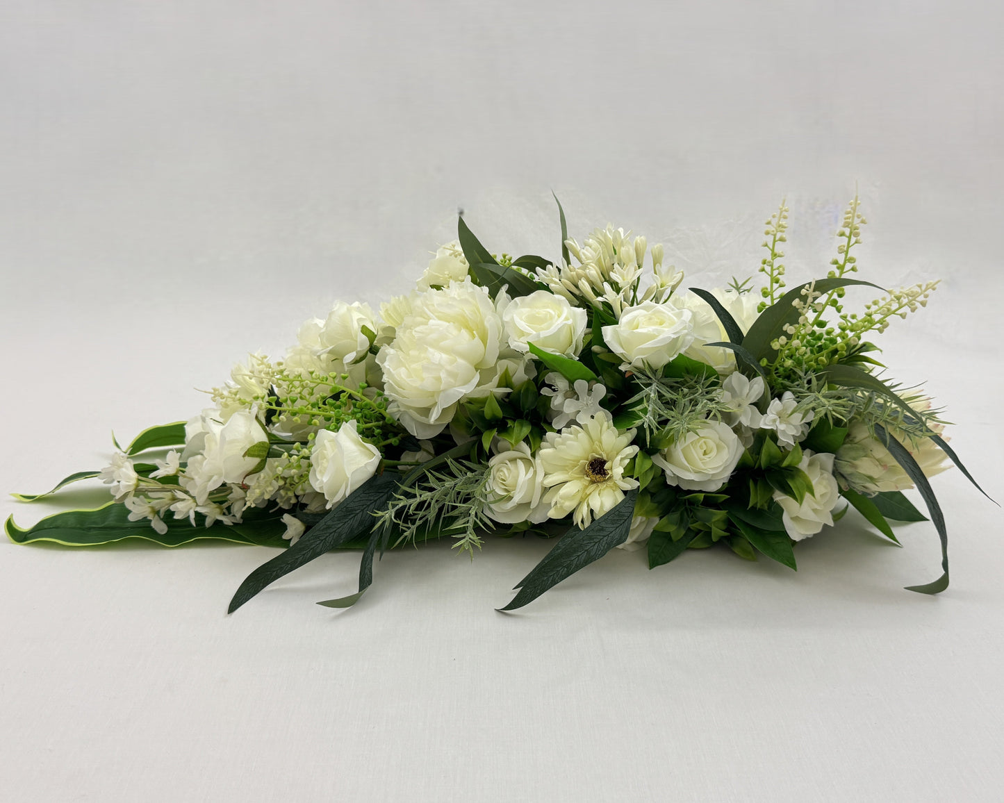 Rouwboeket met witte bloemen