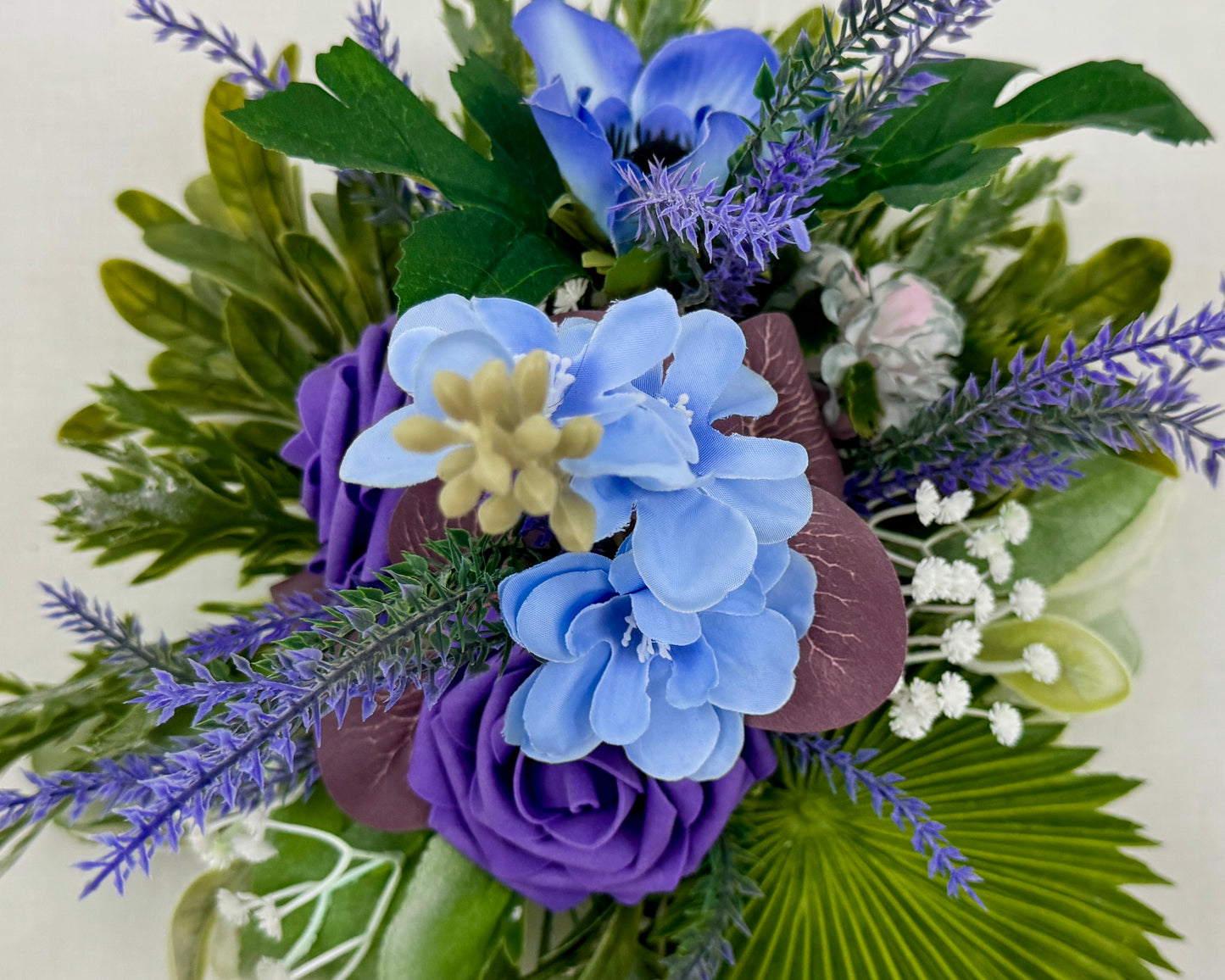 Mini rouwboeket van boven gezien