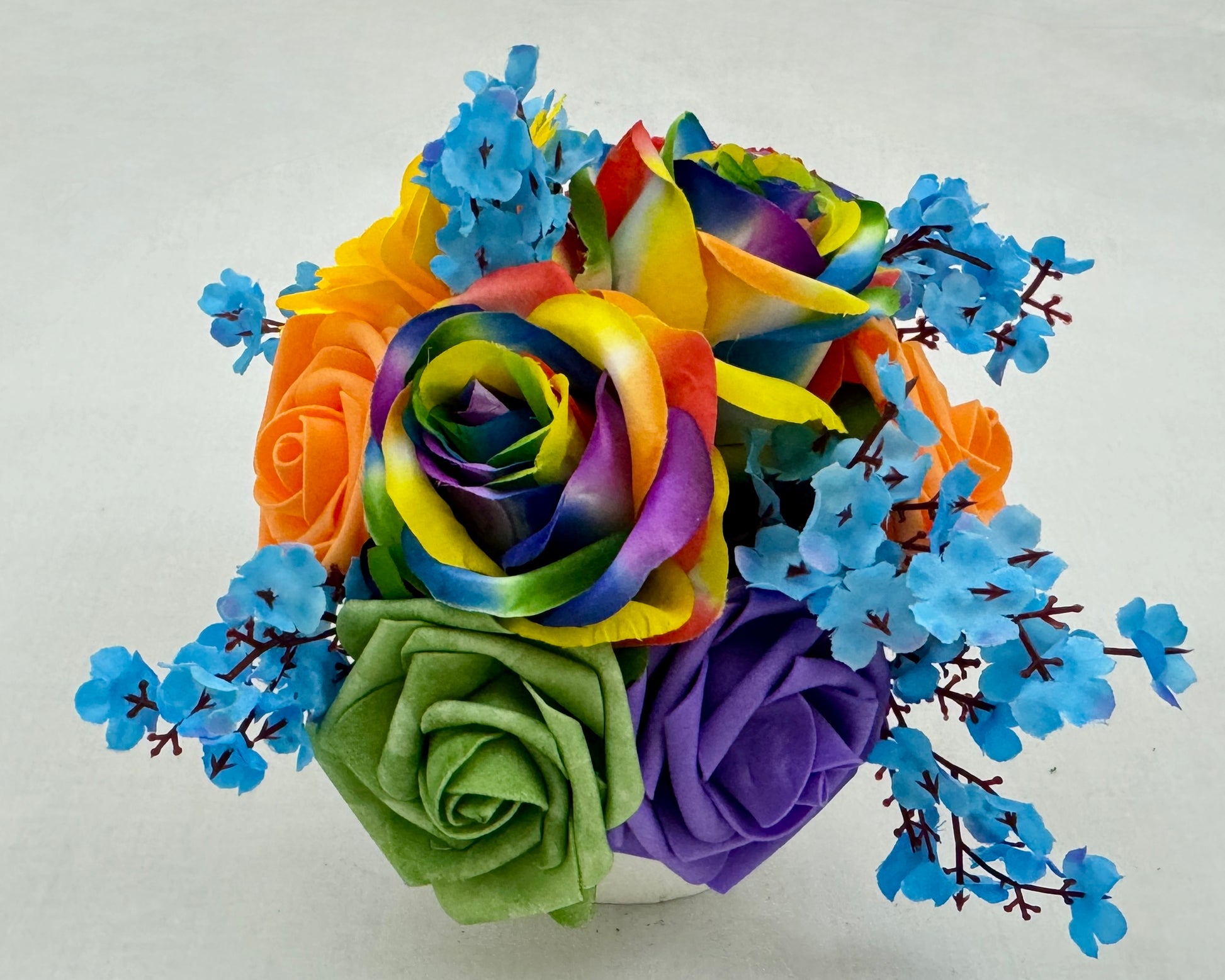 mini rouwboeket van gekleurde rozen