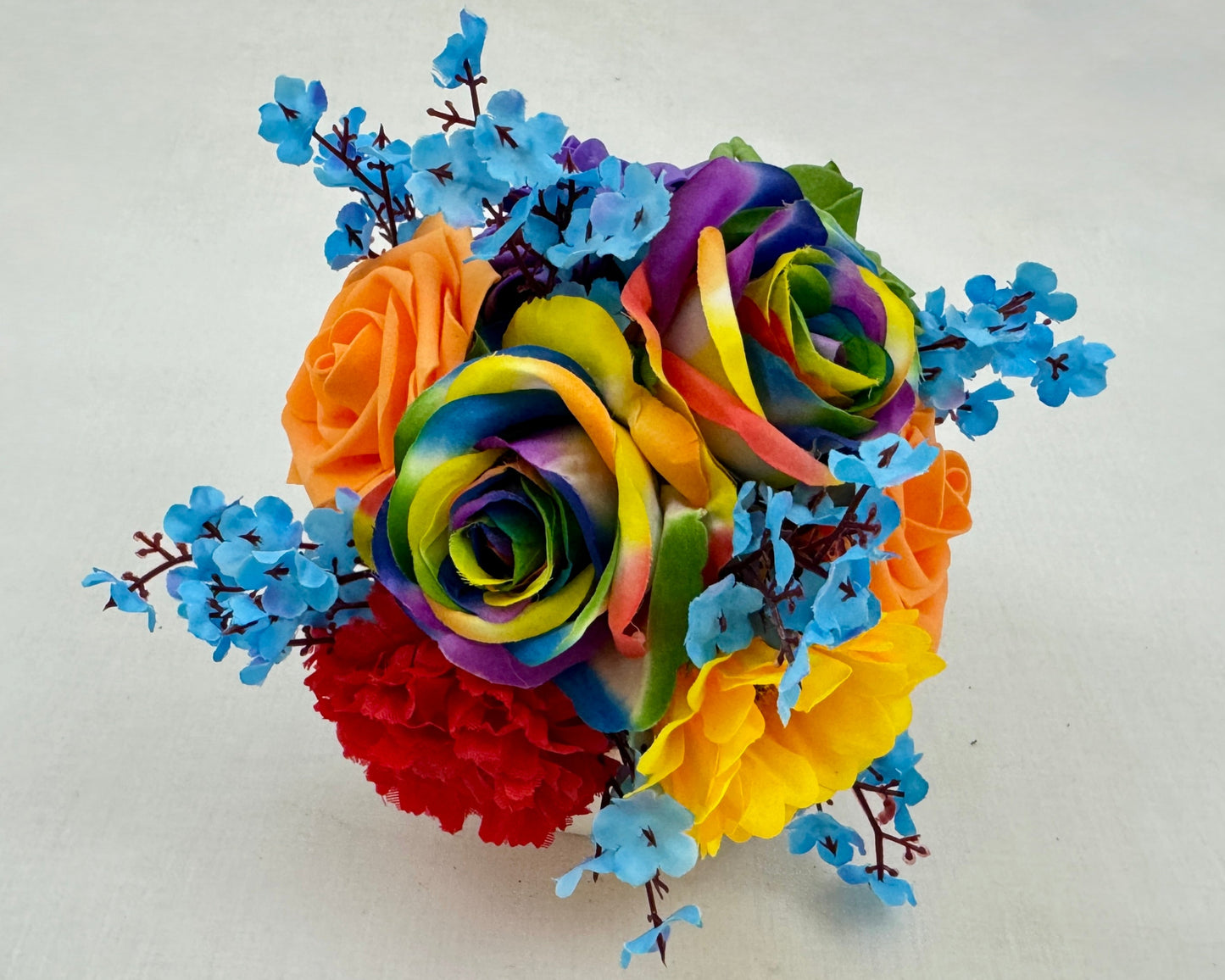 mini rouwboeket van gekleurde rozen