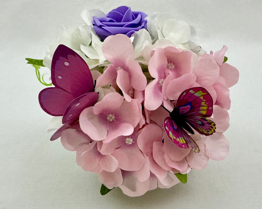 Mini rouwstuk van hortensia's en vlindertjes